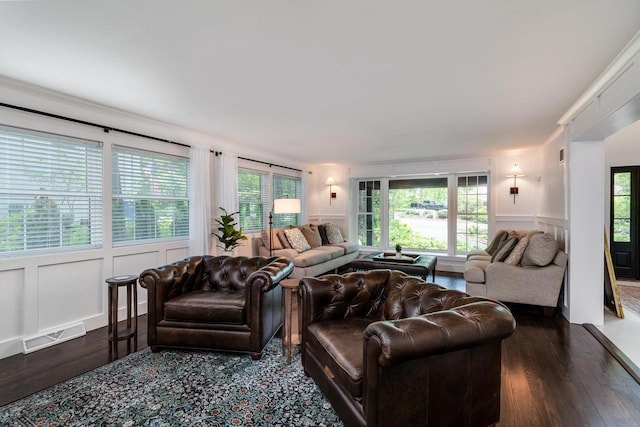 810 Farwell Dr, Madison, WI 53704 - living room with a decorative wall, dark wood-type flooring, plenty of natural light, and wainscoting