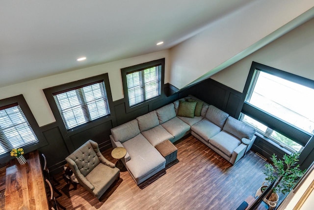 810 Farwell Dr, Madison, WI 53704 - living room with wood finished floors, a wainscoted wall, recessed lighting, and a decorative wall