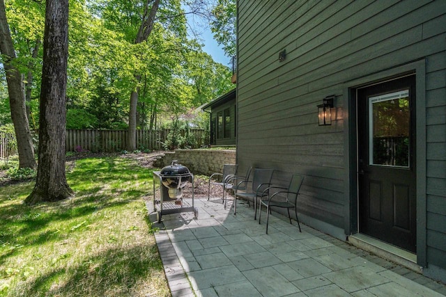 810 Farwell Dr, Madison, WI 53704 - view of patio with a grill and fence