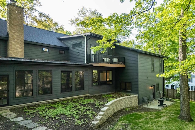 810 Farwell Dr, Madison, WI 53704 - back of house featuring a balcony, fence, and a patio area