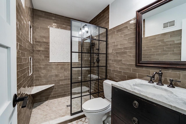 810 Farwell Dr, Madison, WI 53704 - full bathroom with tile walls, a tile shower, toilet, and vanity