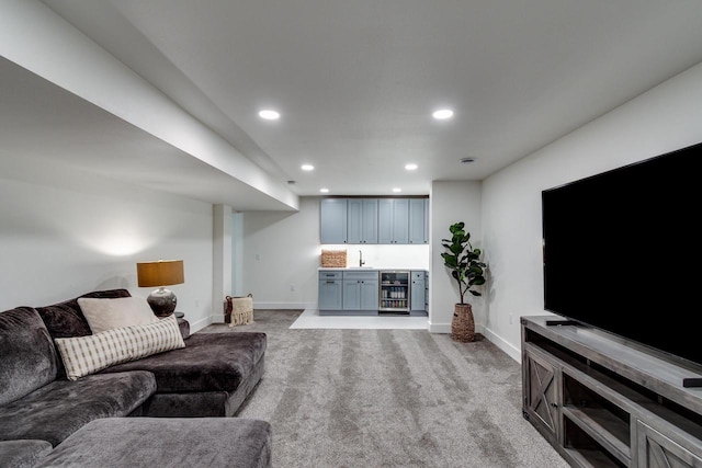 810 Farwell Dr, Madison, WI 53704 - living area with beverage cooler, wet bar, carpet, baseboards, and recessed lighting