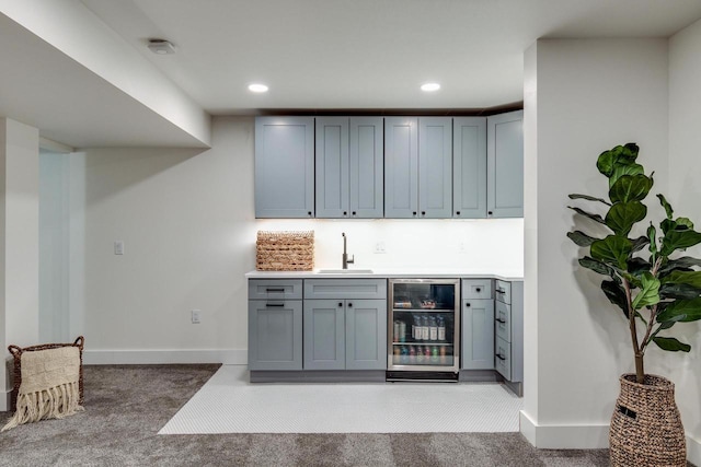 810 Farwell Dr, Madison, WI 53704 - indoor wet bar featuring wine cooler, light colored carpet, baseboards, and recessed lighting