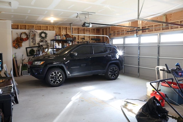 8505 Hinner Springs Dr, Weston, WI 54476 - garage featuring a garage door opener
