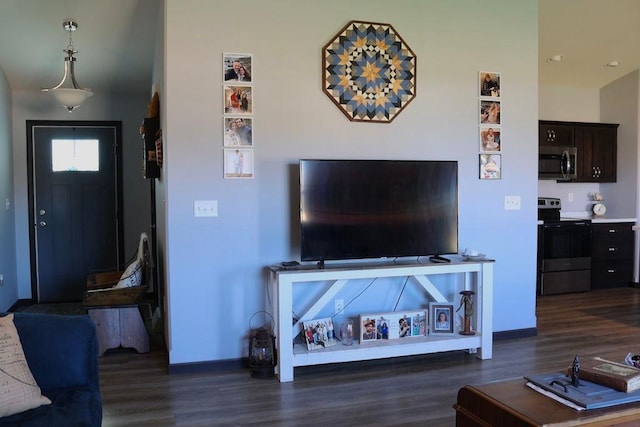 8505 Hinner Springs Dr, Weston, WI 54476 - living area with dark wood-style flooring and baseboards