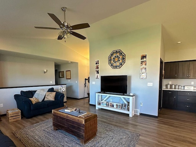 8505 Hinner Springs Dr, Weston, WI 54476 - living area with dark wood-style floors, a ceiling fan, lofted ceiling, and baseboards