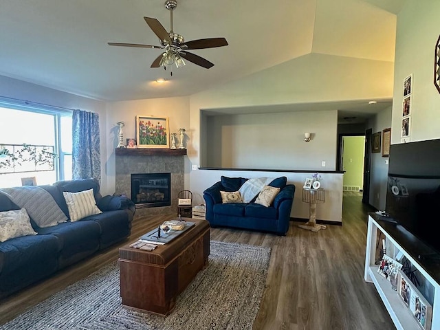 8505 Hinner Springs Dr, Weston, WI 54476 - living room featuring wood finished floors, ceiling fan, a fireplace, and vaulted ceiling