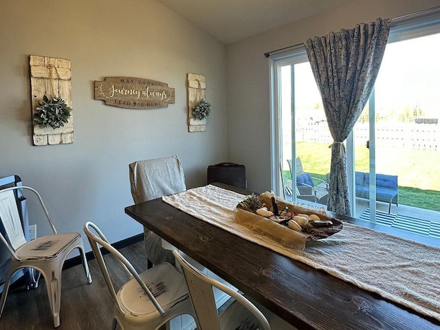 8505 Hinner Springs Dr, Weston, WI 54476 - dining area with wood finished floors, vaulted ceiling, and baseboards