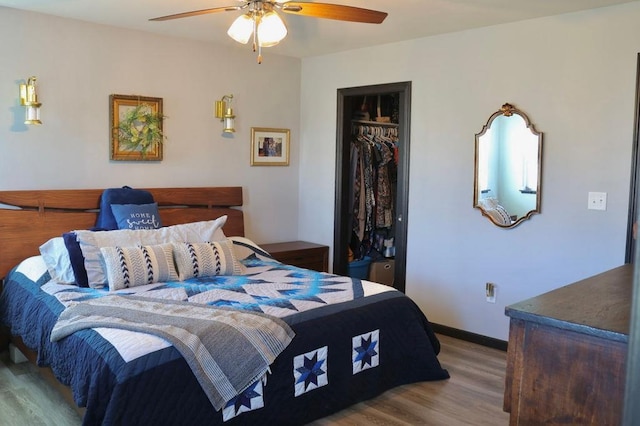 8505 Hinner Springs Dr, Weston, WI 54476 - bedroom featuring wood finished floors, a closet, a ceiling fan, and baseboards