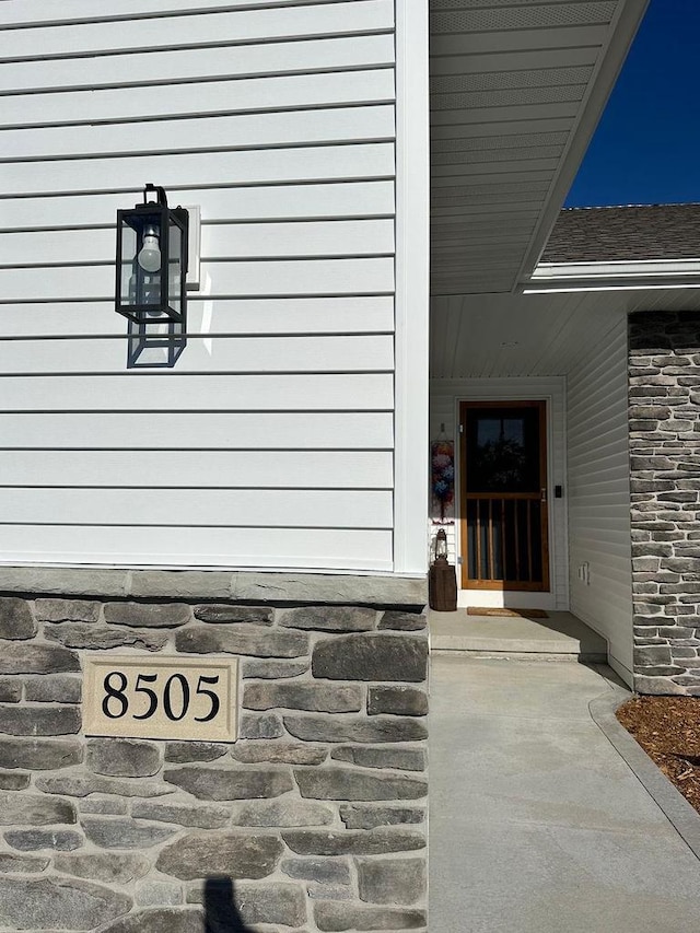 8505 Hinner Springs Dr, Weston, WI 54476 - view of exterior entry featuring stone siding