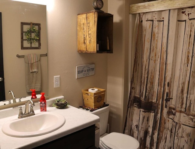 8505 Hinner Springs Dr, Weston, WI 54476 - full bath featuring toilet, vanity, and curtained shower