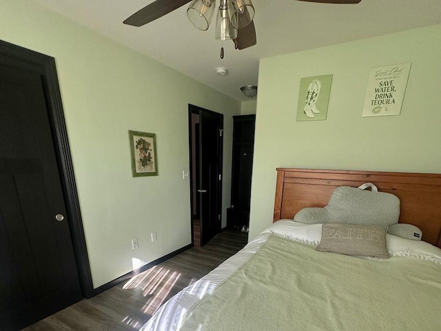 8505 Hinner Springs Dr, Weston, WI 54476 - bedroom featuring wood finished floors, a ceiling fan, and baseboards
