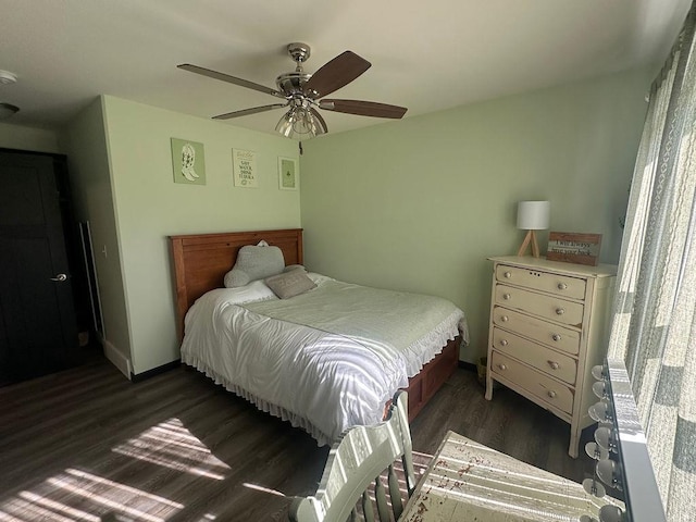 8505 Hinner Springs Dr, Weston, WI 54476 - bedroom with dark wood-style floors, baseboards, and ceiling fan
