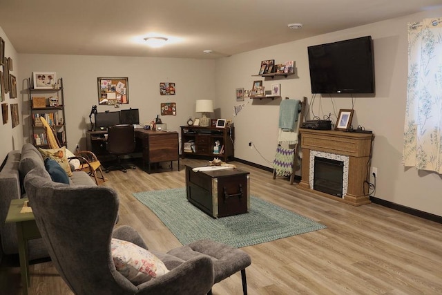 8505 Hinner Springs Dr, Weston, WI 54476 - living area with light wood-style floors, an office area, and baseboards