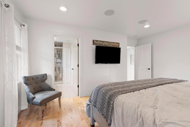 2074 Sandy Springs Rd, De Pere, WI 54115 - bedroom with light wood finished floors, baseboards, and connected bathroom