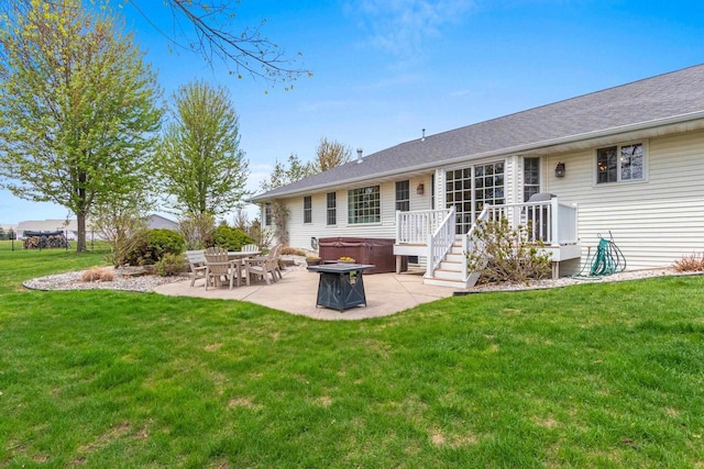 2074 Sandy Springs Rd, De Pere, WI 54115 - back of property with a hot tub, a patio, a yard, and a deck