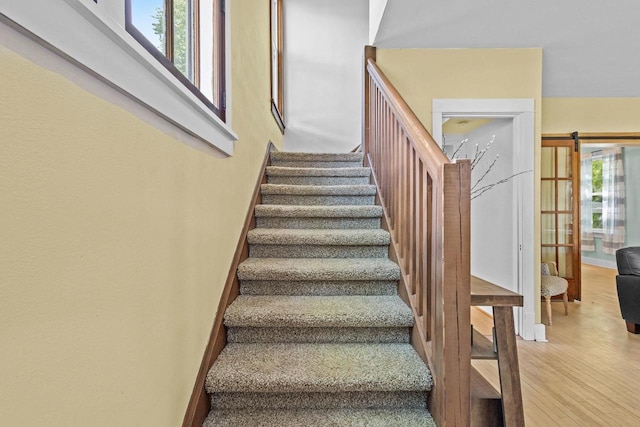 1333 W Lawrence St, Appleton, WI 54914 - stairway featuring healthy amount of natural light and wood finished floors