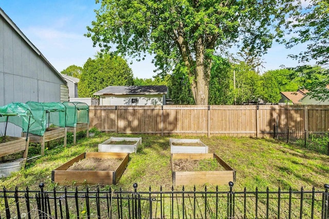 1333 W Lawrence St, Appleton, WI 54914 - view of yard featuring a vegetable garden