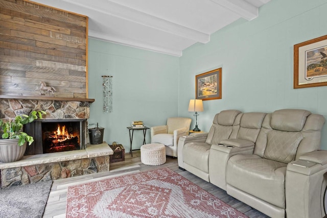 1333 W Lawrence St, Appleton, WI 54914 - living room featuring beam ceiling, a fireplace, and wood finished floors