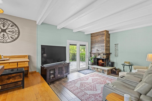 1333 W Lawrence St, Appleton, WI 54914 - living room featuring beamed ceiling, wood-type flooring, and a large fireplace
