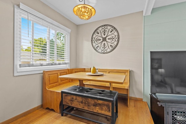 1333 W Lawrence St, Appleton, WI 54914 - dining space featuring light wood-type flooring, baseboards, and a chandelier