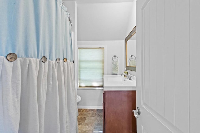 1333 W Lawrence St, Appleton, WI 54914 - bathroom featuring vanity and toilet