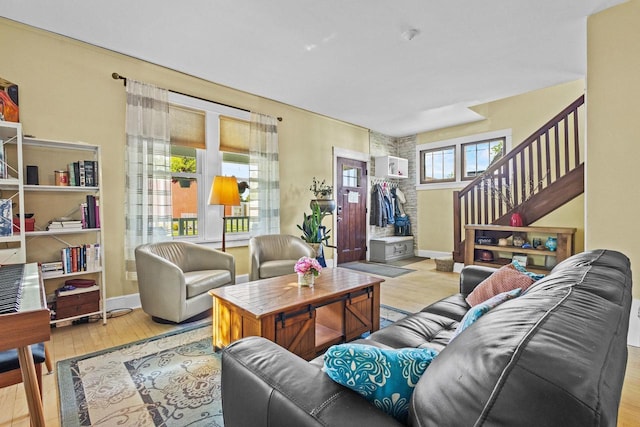 1333 W Lawrence St, Appleton, WI 54914 - living area with wood finished floors, stairs, and baseboards