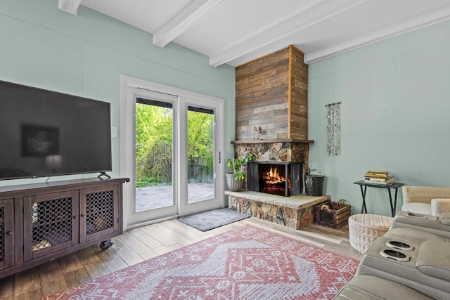 1333 W Lawrence St, Appleton, WI 54914 - living room with beam ceiling, a fireplace, wood finished floors, and wood walls