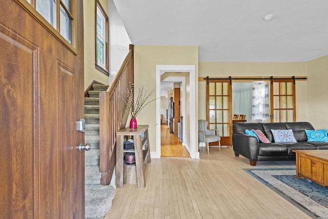 1333 W Lawrence St, Appleton, WI 54914 - entryway featuring light wood finished floors, stairs, and french doors