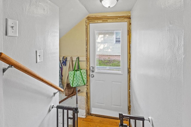 1333 W Lawrence St, Appleton, WI 54914 - entryway with vaulted ceiling, wood finished floors, and a textured wall