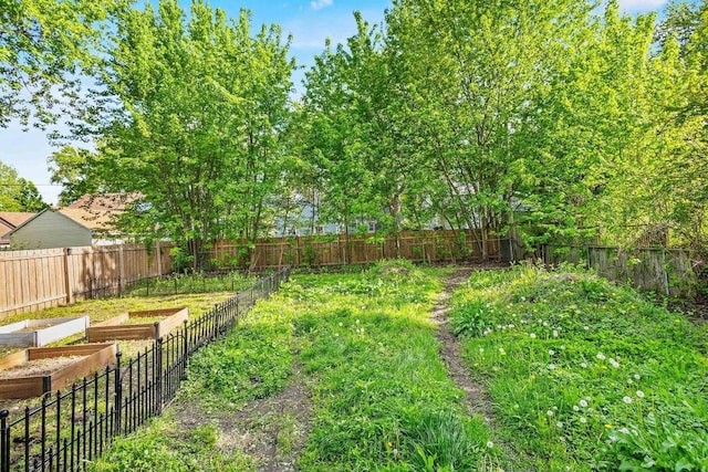 1333 W Lawrence St, Appleton, WI 54914 - fenced backyard featuring a garden