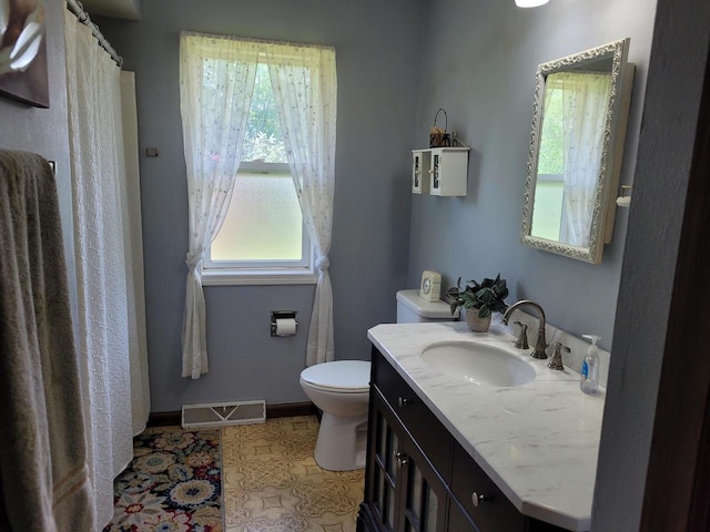 N4516 Hazelwood Rd, Hustisford, WI 53034 - bathroom with toilet, vanity, a shower with curtain, and baseboards