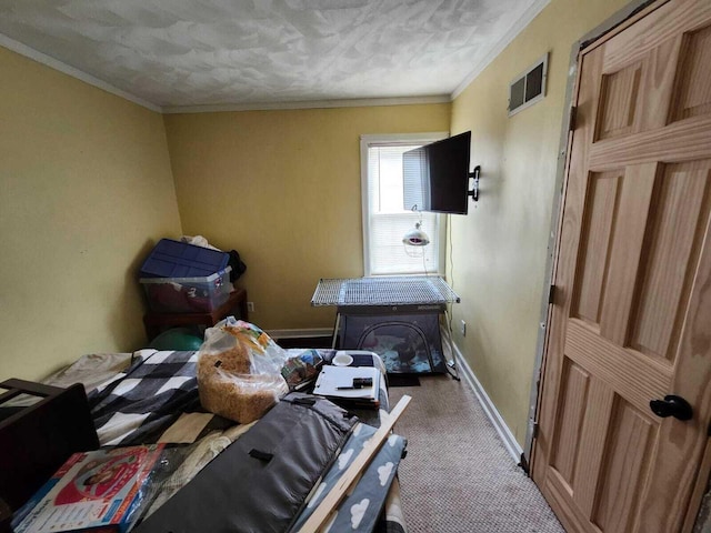 805 S Wacouta Ave, Prairie Du Chien, WI 53821 - carpeted bedroom with baseboards and crown molding