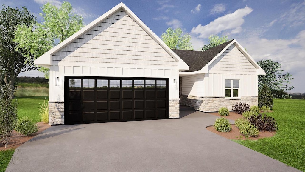 708 Reeve Rd, Mazomanie, WI 53560 - view of front of house with stone siding, board and batten siding, an attached garage, and a front yard