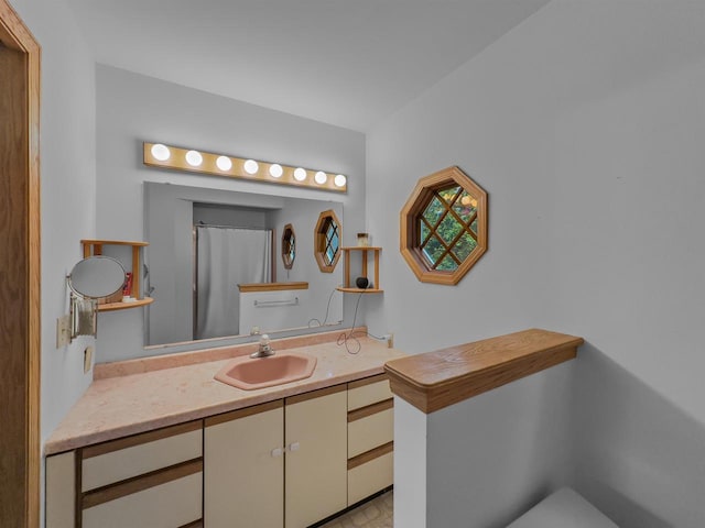 911 Fawn Ln, Port Edwards, WI 54469 - bathroom with vanity, toilet, and curtained shower