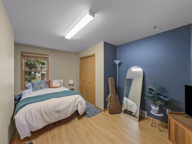 911 Fawn Ln, Port Edwards, WI 54469 - bedroom with wood finished floors and arched walkways