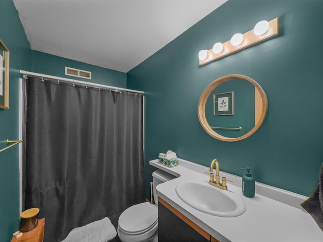 911 Fawn Ln, Port Edwards, WI 54469 - bathroom with toilet, vanity, and curtained shower