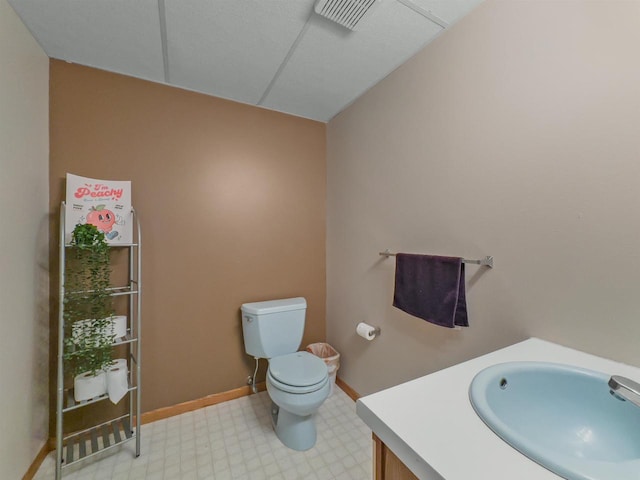 911 Fawn Ln, Port Edwards, WI 54469 - bathroom featuring toilet, tile patterned floors, and vanity