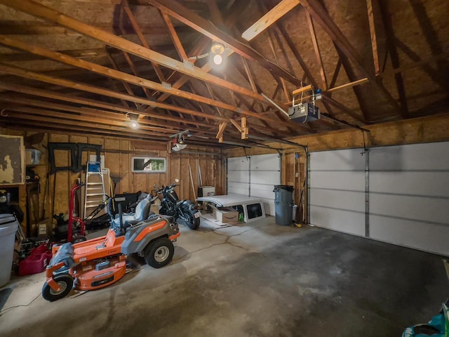 911 Fawn Ln, Port Edwards, WI 54469 - garage featuring a garage door opener