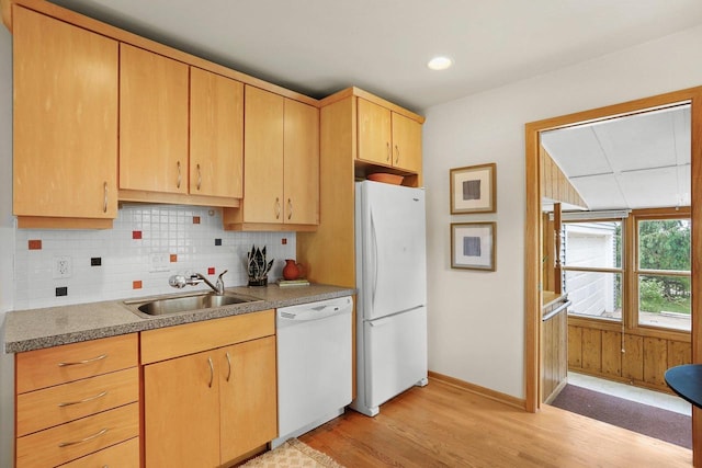 5406 Marsha Dr, Madison, WI 53705 - kitchen featuring white appliances, a sink, light brown cabinets, light wood finished floors, and tasteful backsplash
