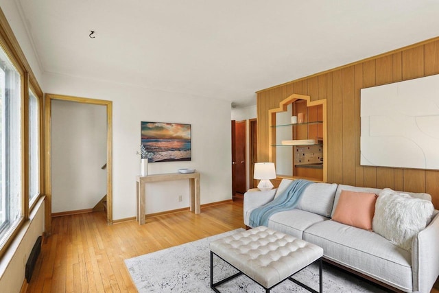 5406 Marsha Dr, Madison, WI 53705 - living area with light wood-style floors, baseboards, and wooden walls
