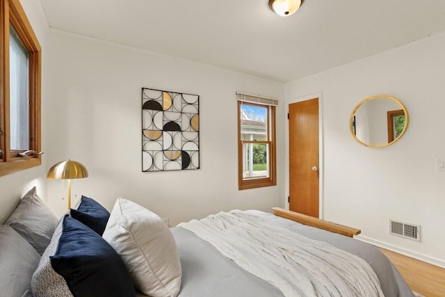 5406 Marsha Dr, Madison, WI 53705 - bedroom with wood finished floors and baseboards