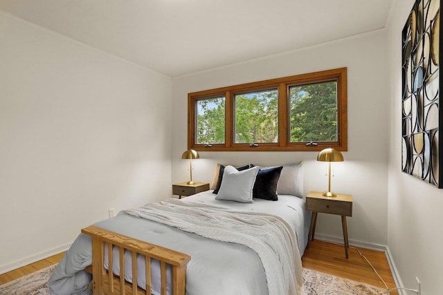 5406 Marsha Dr, Madison, WI 53705 - bedroom with baseboards and wood finished floors