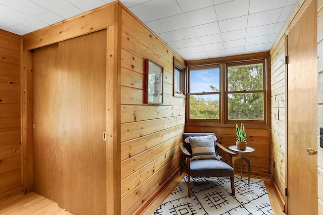 5406 Marsha Dr, Madison, WI 53705 - sitting room with wood walls and light wood-style flooring