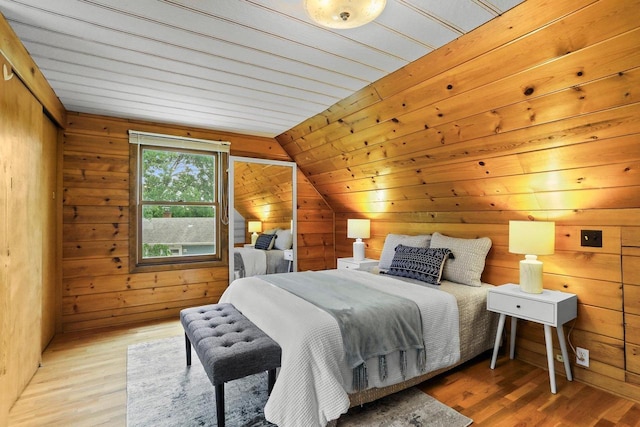 5406 Marsha Dr, Madison, WI 53705 - bedroom with wood finished floors, wood walls, and lofted ceiling