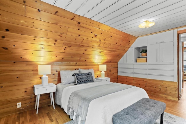 5406 Marsha Dr, Madison, WI 53705 - bedroom featuring vaulted ceiling, light wood-type flooring, wood walls, and wooden ceiling