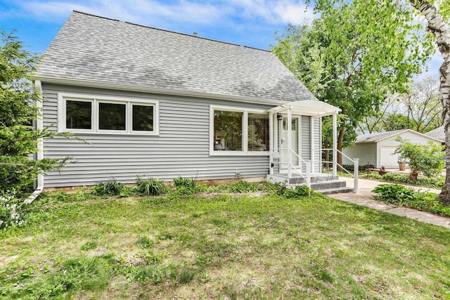 5406 Marsha Dr, Madison, WI 53705 - view of front facade featuring a shingled roof and a front yard