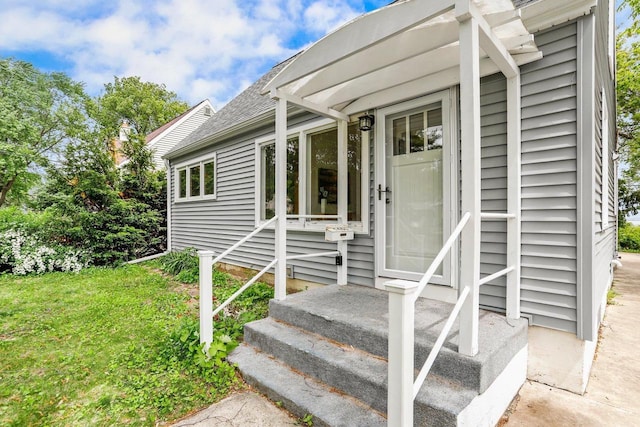 5406 Marsha Dr, Madison, WI 53705 - doorway to property featuring roof with shingles