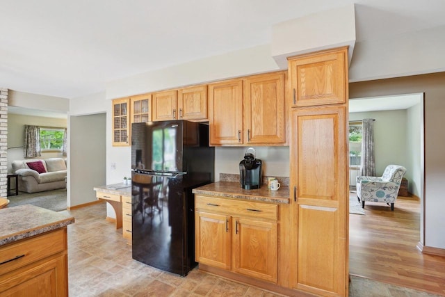 4901 Ralph Cir, Madison, WI 53714 - kitchen with freestanding refrigerator and glass insert cabinets