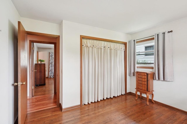 4901 Ralph Cir, Madison, WI 53714 - bedroom with light wood-type flooring, baseboards, and a closet